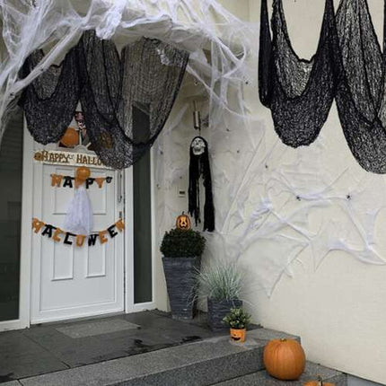 Stor Kunstig Spindelvæv til Halloween – Skab den Perfekte Uhyggelige Stemning